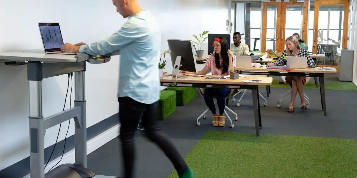 man using an office treadmill