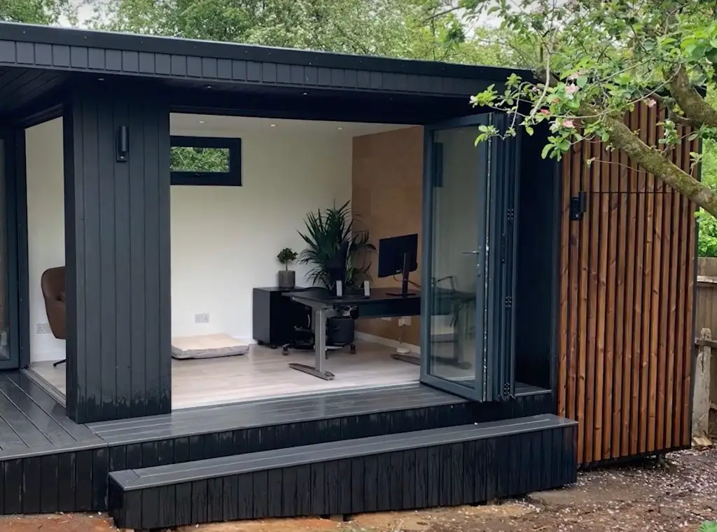 garden office with storage on slope